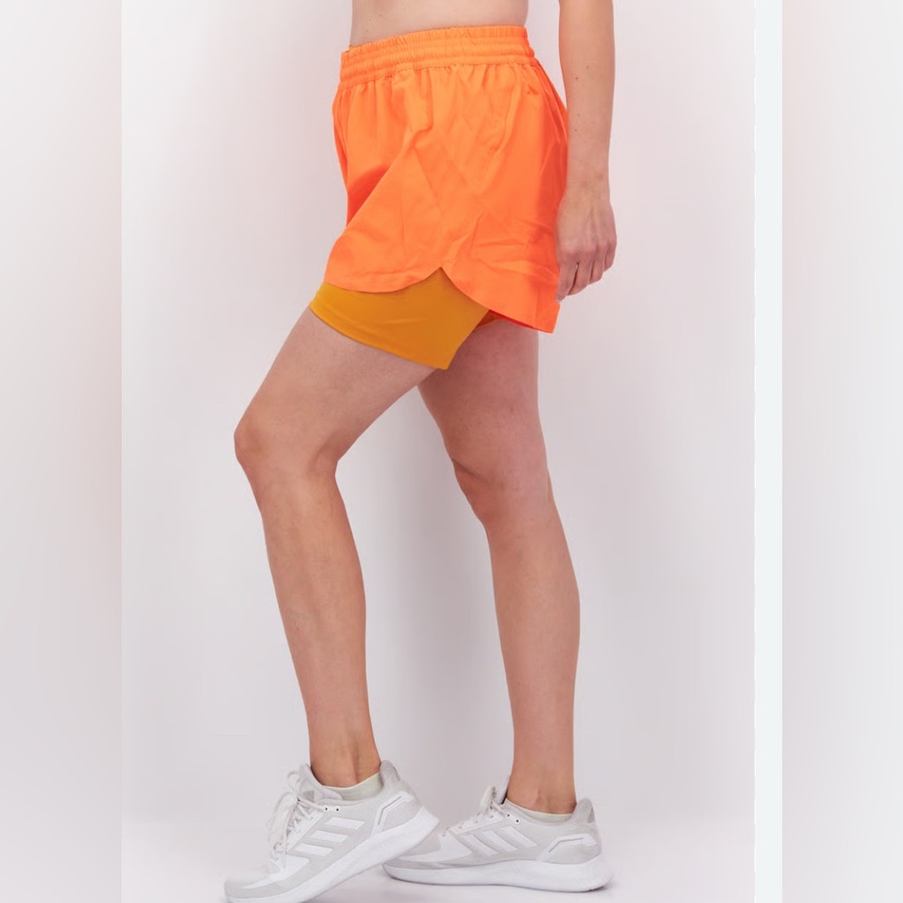 IVY PARK x adidas shorts Bright Orange